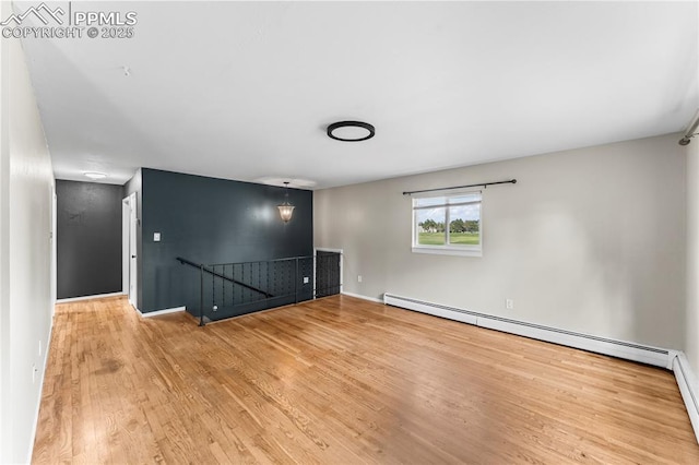 232 S Hancock Ave, Colorado Springs, CO 80903 - empty room featuring baseboard heating and wood finished floors