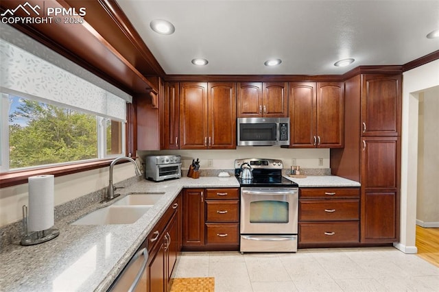 1105 Parkview Blvd, Colorado Springs, CO 80905 - kitchen with appliances with stainless steel finishes, light stone counters, and recessed lighting