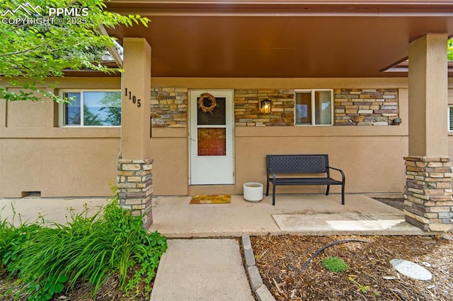 1105 Parkview Blvd, Colorado Springs, CO 80905 - doorway to property with stone siding and stucco siding