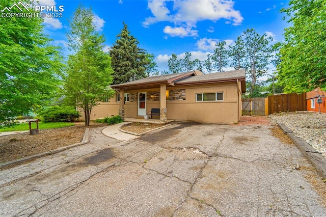 1105 Parkview Blvd, Colorado Springs, CO 80905 - view of front of house with stucco siding and a patio area