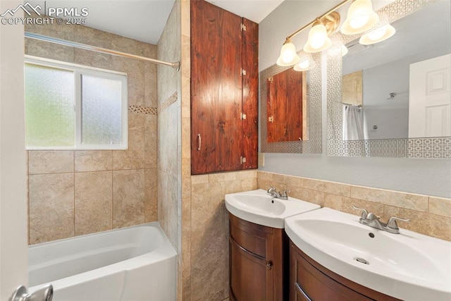 1105 Parkview Blvd, Colorado Springs, CO 80905 - full bathroom with  shower combination, tile walls, and two vanities