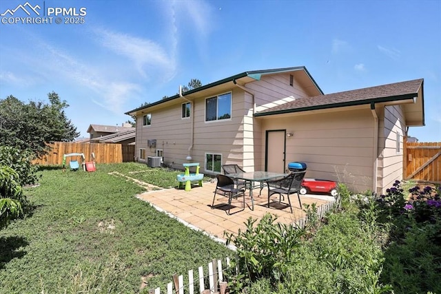 6880 Corn Tassle Dr, Colorado Springs, CO 80911 - back of house featuring a fenced backyard and a patio