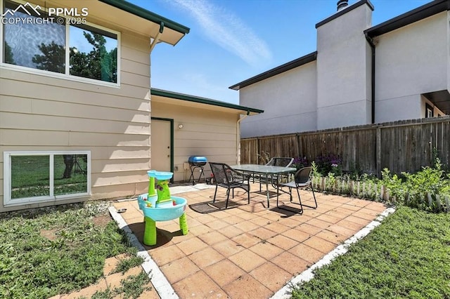 6880 Corn Tassle Dr, Colorado Springs, CO 80911 - view of patio / terrace with outdoor dining area and area for grilling