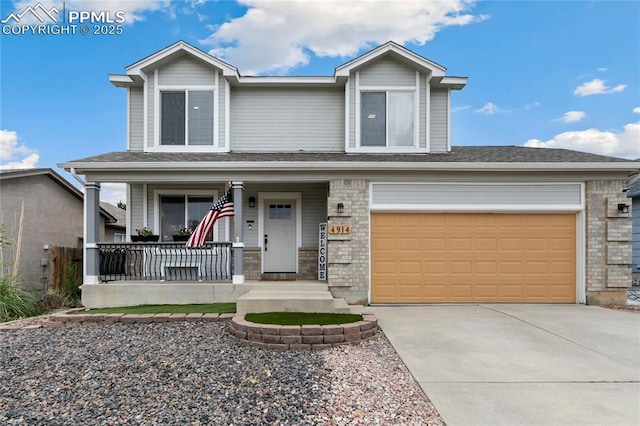4914 Hawk Meadow Dr, Colorado Springs, CO 80916 - view of front facade with a porch and driveway