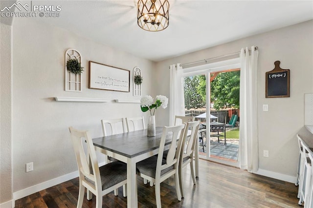 4914 Hawk Meadow Dr, Colorado Springs, CO 80916 - dining area with baseboards and wood finished floors