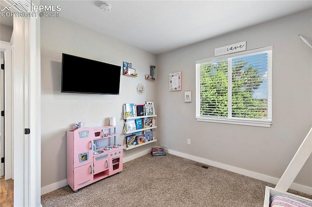 4914 Hawk Meadow Dr, Colorado Springs, CO 80916 - recreation room with carpet and baseboards