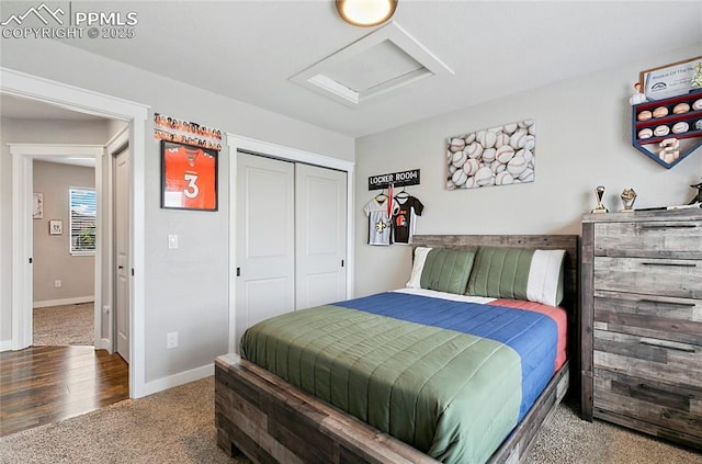 4914 Hawk Meadow Dr, Colorado Springs, CO 80916 - bedroom with attic access, carpet flooring, and a closet