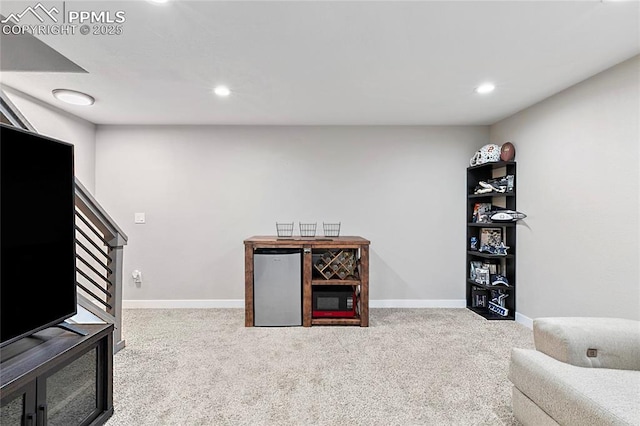 4914 Hawk Meadow Dr, Colorado Springs, CO 80916 - carpeted living room with stairs and recessed lighting