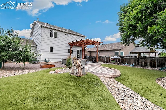 4914 Hawk Meadow Dr, Colorado Springs, CO 80916 - rear view of property featuring a pergola and a patio area