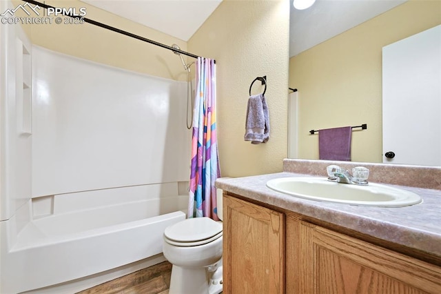 6290 Cording Ct, Colorado Springs, CO 80922 - bathroom with vanity, shower / tub combo, and wood finished floors
