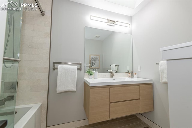 2510 Old Broadmoor Rd, Colorado Springs, CO 80906 - bathroom featuring vanity, shower / tub combination, and wood finish floors