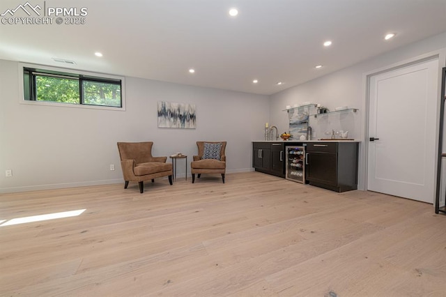 2510 Old Broadmoor Rd, Colorado Springs, CO 80906 - living area with beverage cooler, bar area, light wood-type flooring, and recessed lighting