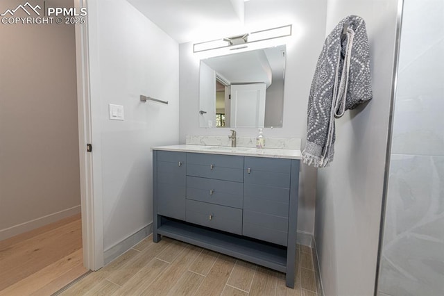 2510 Old Broadmoor Rd, Colorado Springs, CO 80906 - bathroom featuring wood finished floors and vanity