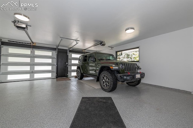 2510 Old Broadmoor Rd, Colorado Springs, CO 80906 - garage featuring a garage door opener