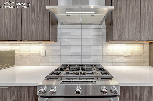1231 Newton St, Denver, CO 80204 - kitchen with gas range, ventilation hood, backsplash, and light countertops
