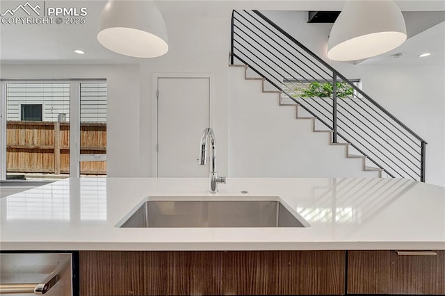 1231 Newton St, Denver, CO 80204 - kitchen featuring light countertops and recessed lighting