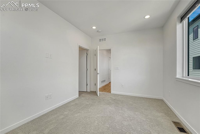 1231 Newton St, Denver, CO 80204 - unfurnished bedroom featuring carpet flooring and recessed lighting
