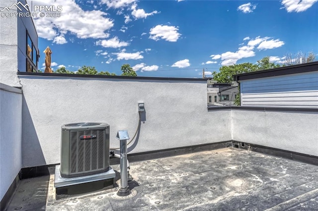 1231 Newton St, Denver, CO 80204 - exterior view of a cooling unit and stucco siding