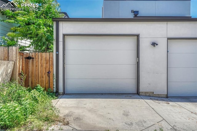 1231 Newton St, Denver, CO 80204 - garage featuring driveway