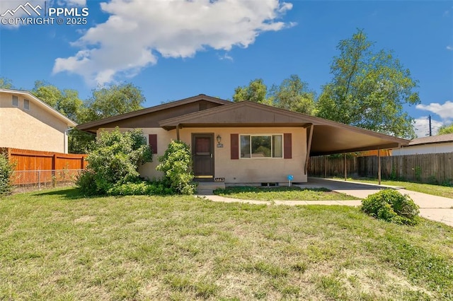 1443 Luna Dr, Fountain, CO 80817 - view of front facade featuring concrete driveway and a carport