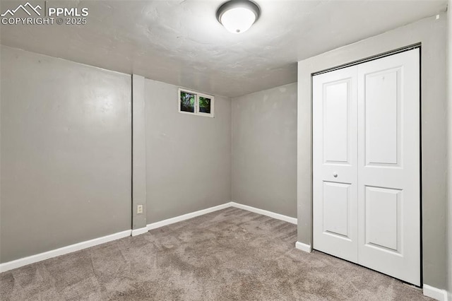 1443 Luna Dr, Fountain, CO 80817 - below grade area featuring carpet floors and baseboards