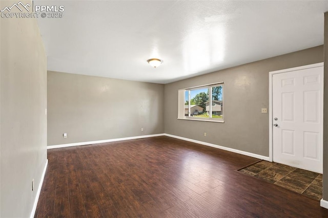 1443 Luna Dr, Fountain, CO 80817 - entryway with wood finished floors and baseboards