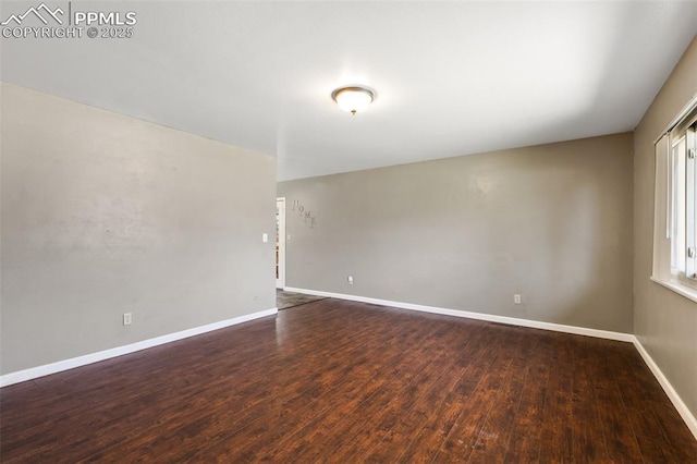 1443 Luna Dr, Fountain, CO 80817 - empty room with wood finished floors and baseboards