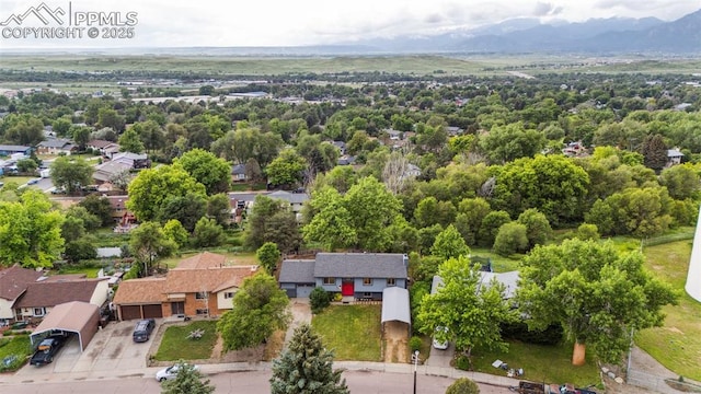 7030 Metropolitan St, Colorado Springs, CO 80911 - aerial view of residential area featuring a mountain backdrop