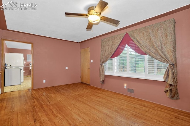822 W Monroe St, Colorado Springs, CO 80907 - spare room with wood finished floors and a ceiling fan