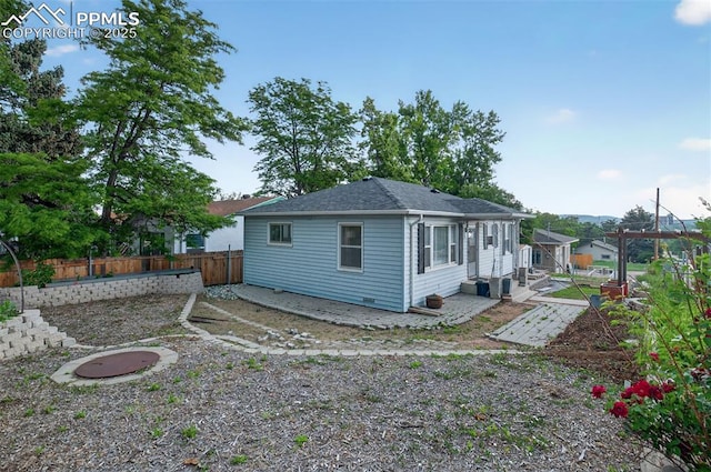 822 W Monroe St, Colorado Springs, CO 80907 - rear view of property with roof with shingles