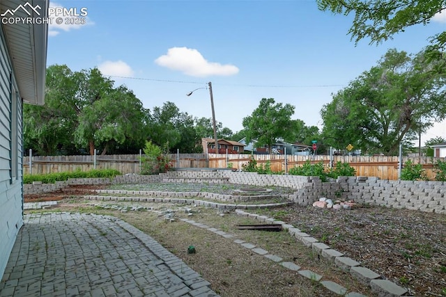 822 W Monroe St, Colorado Springs, CO 80907 - fenced backyard featuring a patio