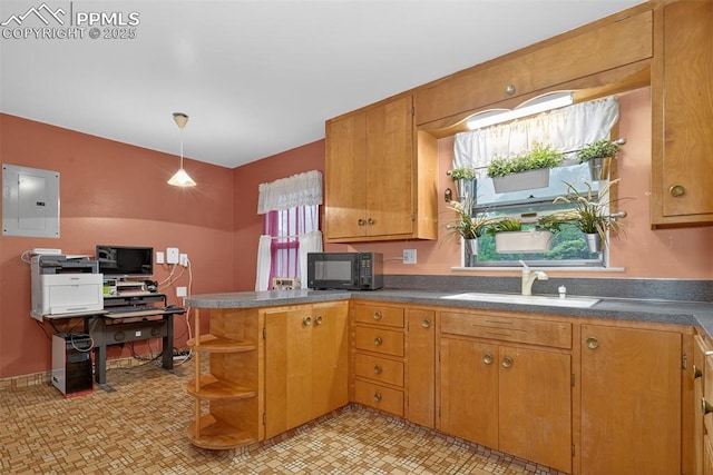 822 W Monroe St, Colorado Springs, CO 80907 - kitchen featuring black microwave, electric panel, open shelves, and brown cabinets