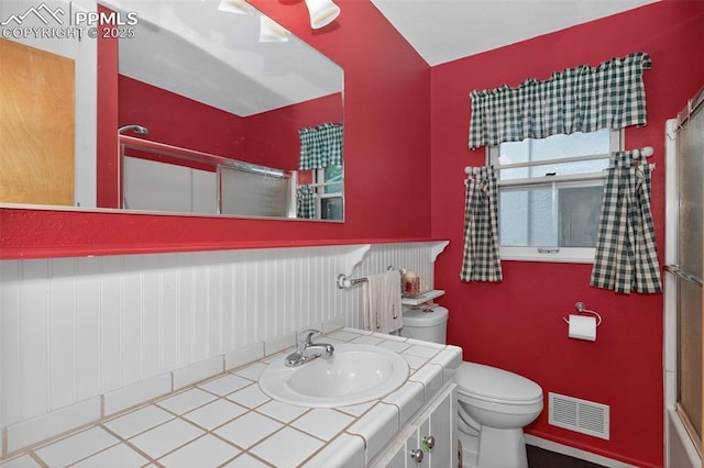 822 W Monroe St, Colorado Springs, CO 80907 - bathroom with vanity and a shower