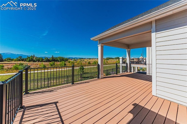 5960 Bennach Grv, Colorado Springs, CO 80927 - wooden deck featuring a mountain view