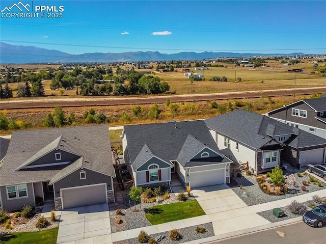 5960 Bennach Grv, Colorado Springs, CO 80927 - aerial view of residential area featuring a mountain backdrop