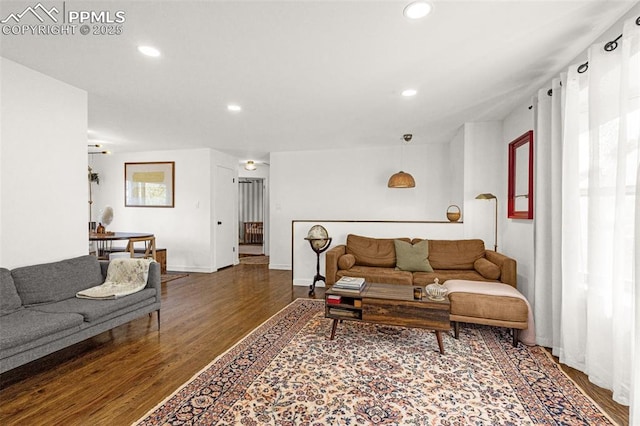 3619 Regis St, Colorado Springs, CO 80909 - living area featuring wood finished floors and recessed lighting
