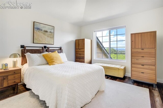 5775 Sonnet Hts, Colorado Springs, CO 80918 - bedroom with dark wood-style floors and baseboards