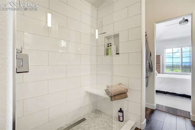 5775 Sonnet Hts, Colorado Springs, CO 80918 - bathroom featuring connected bathroom, wood finished floors, and a tile shower