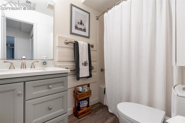 5775 Sonnet Hts, Colorado Springs, CO 80918 - full bathroom with vanity, wood finished floors, and shower / bathtub combination with curtain