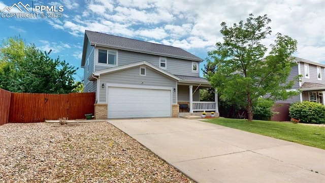 2160 Ance St, Strasburg, CO 80136 - traditional-style house with a porch, brick siding, driveway, and an attached garage