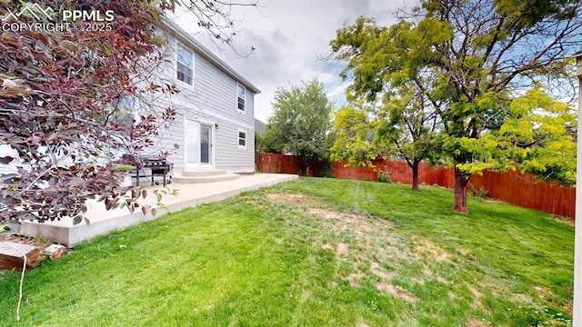 2160 Ance St, Strasburg, CO 80136 - fenced backyard featuring a patio