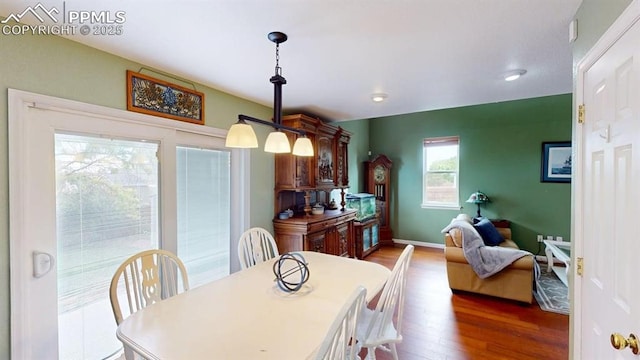 2160 Ance St, Strasburg, CO 80136 - dining room with wood finished floors and recessed lighting