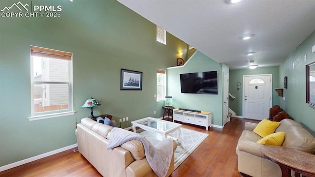 2160 Ance St, Strasburg, CO 80136 - living room with wood finished floors and baseboards