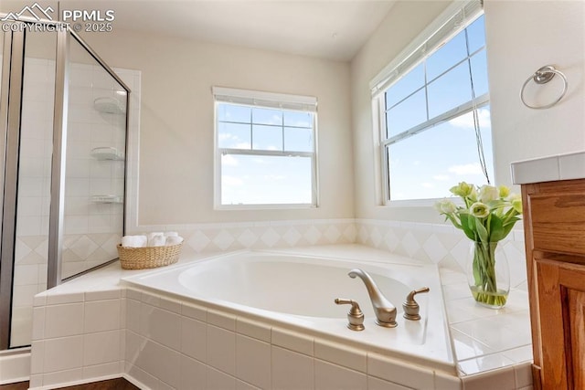 9891 Red Sage Dr, Colorado Springs, CO 80920 - full bathroom with a garden tub and a stall shower