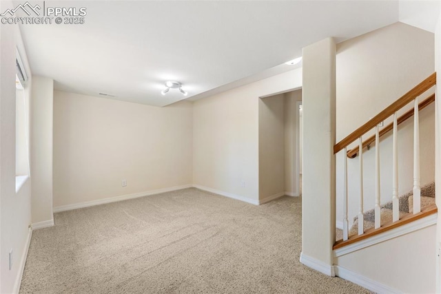 9891 Red Sage Dr, Colorado Springs, CO 80920 - carpeted spare room featuring baseboards and stairs