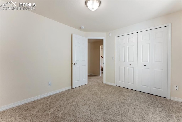9891 Red Sage Dr, Colorado Springs, CO 80920 - unfurnished bedroom featuring carpet floors and a closet