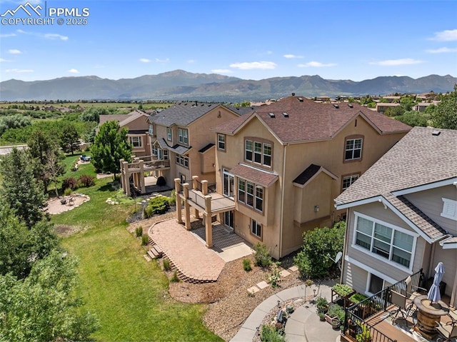 9891 Red Sage Dr, Colorado Springs, CO 80920 - aerial perspective of suburban area featuring a mountain backdrop