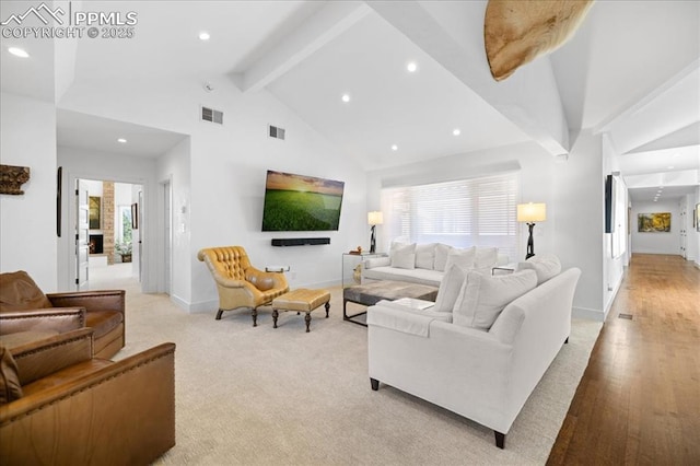 18 2nd St, Colorado Springs, CO 80906 - living area featuring beam ceiling, recessed lighting, high vaulted ceiling, light colored carpet, and light wood-type flooring
