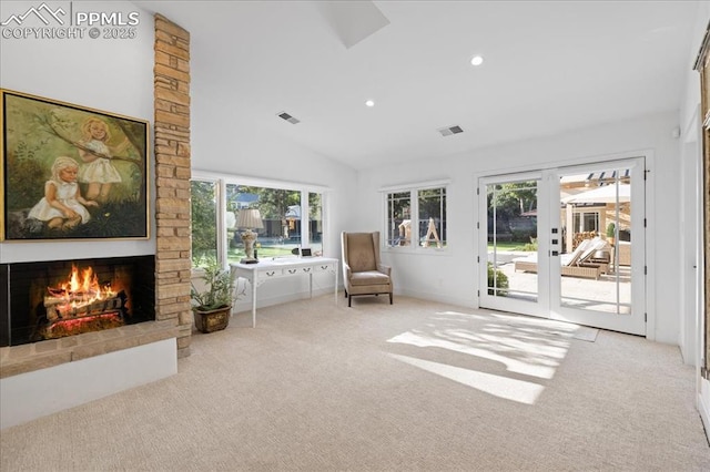 18 2nd St, Colorado Springs, CO 80906 - sitting room with carpet, a large fireplace, lofted ceiling, french doors, and recessed lighting