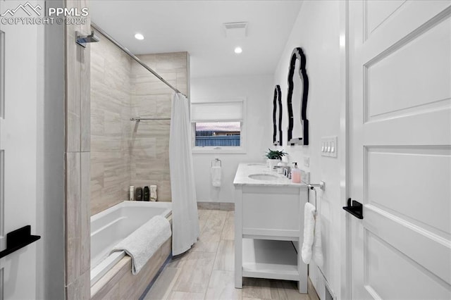 18 2nd St, Colorado Springs, CO 80906 - bathroom with shower / bath combination with curtain, vanity, and recessed lighting